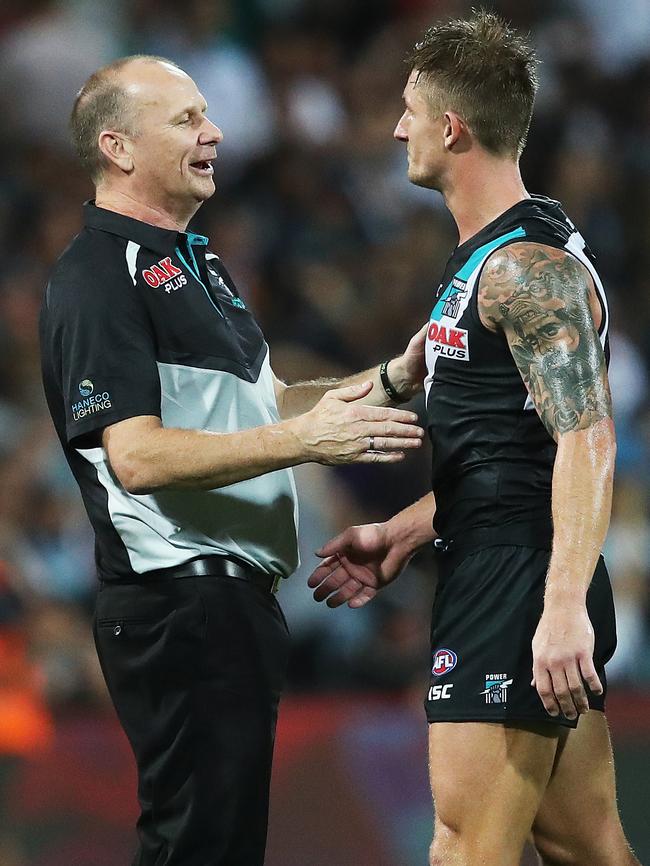 Port Adelaide coach Ken Hinkley with Hamish Hartlett after the match. Picture. Phil Hillyard