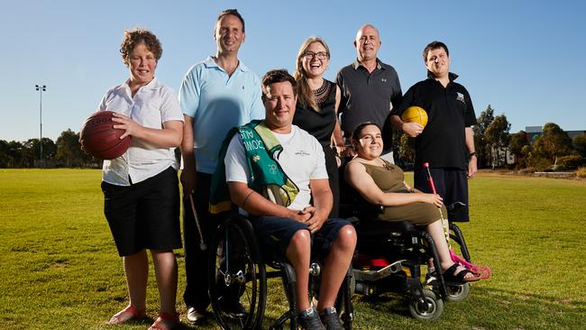 Basketballer Catherine Beinke, cricketer Michael Zannis, Para triathlete Scott Crowley with Katrina Ranford, Gary Sutherland, Power Chair athlete Chantel Bongiovanni and footballer Toby Sutherland. Picture: Matt Loxton