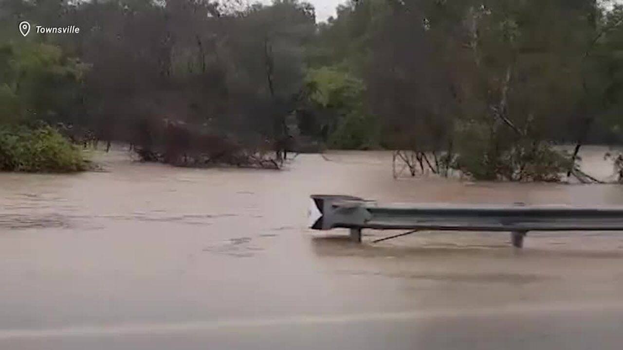 Suburbs under water, roads closed as flooding hits Townsville