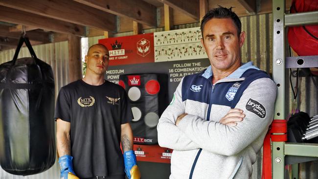 NSW Origin coach Brad Fitlerm pictured at his backyard gym with young boxer Mateo Tapia says PCYCs could be playing a significant role in the lives of young people. Picture: Sam Ruttyn