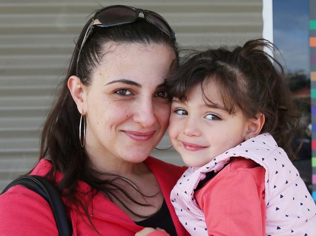 Werribee tops Victoria's list of suburbs receiving welfare and is the fifth highest in the country for government allowances and payments. Pictured outside Werribee Centrelink is Tagreed Lutfi and daughter Mary 3Picture: Mark Wilson