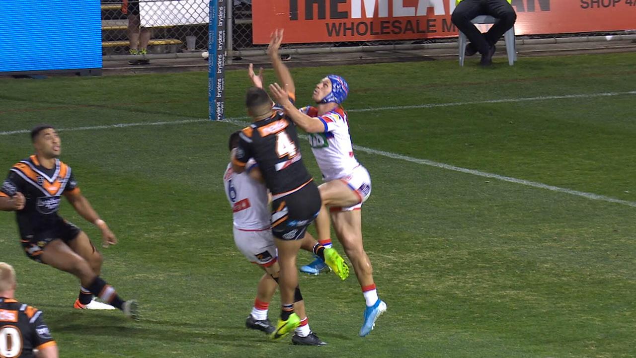 Kalyn Ponga is challenged by Esan Marsters