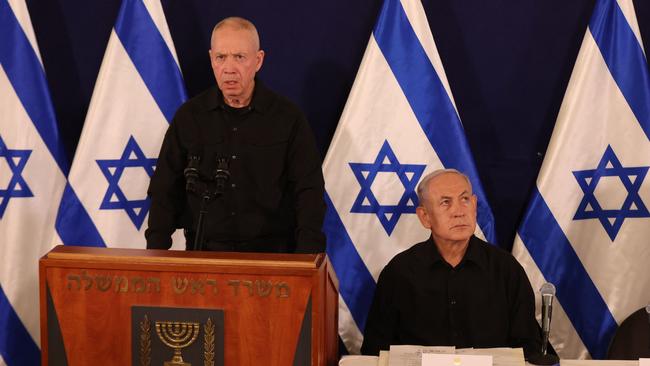 Israeli Defence Minister Yoav Gallant and Prime Minister Benjamin Netanyahu attend a press conference in the Kirya military base in Tel Aviv.