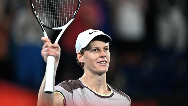 Italy's Jannik Sinner celebrates victory against Russia's Andrey Rublev during their men's singles quarter-final match on day 10 of the Australian Open. Picture: Anthony Wallace / AFP.