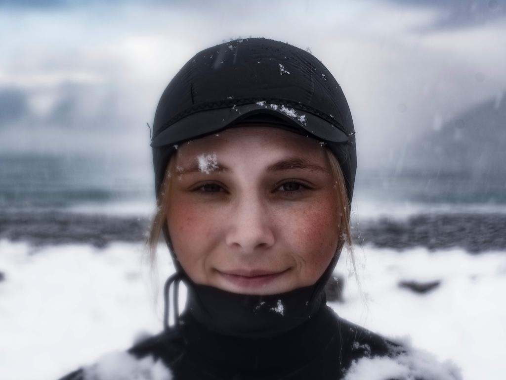 Solmoy Austbo from Norway poses after a surf session, on March 11, 2018 in Unstad northern Norway, Lofoten islands, within the Arctic Circle as air temperature drops minus 13°C and water temperature above 4°C. Picture: AFP