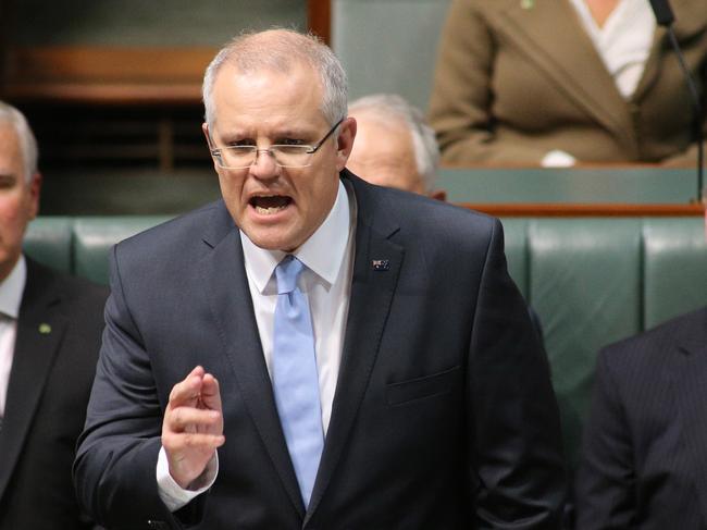 Treasurer Scott Morrison during his Budget speech in the House of Representatives in Parliament House in Canberra. His wife Jenny and daughters Lily and Abbey were in the chamber during the speech.Picture Gary Ramage