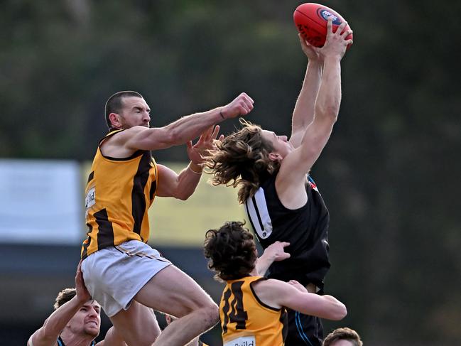 NFL: Lower Plenty’s Darcy Barden tries to spoil Zane Costello of St Mary’s. Picture: Andy Brownbill