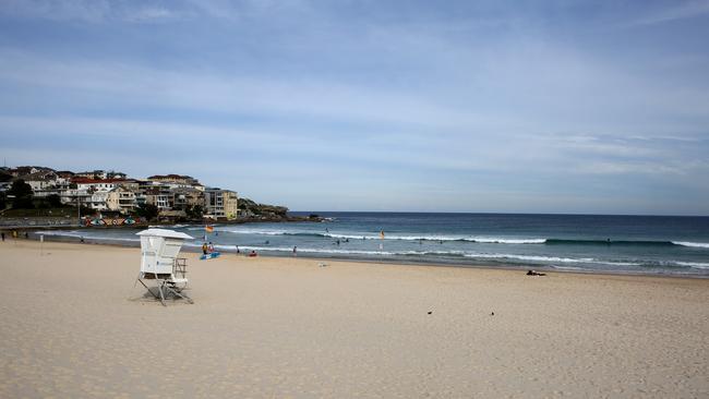 The beach was virtually deserted after the schoolboys got into trouble. Picture: Chris Pavlich