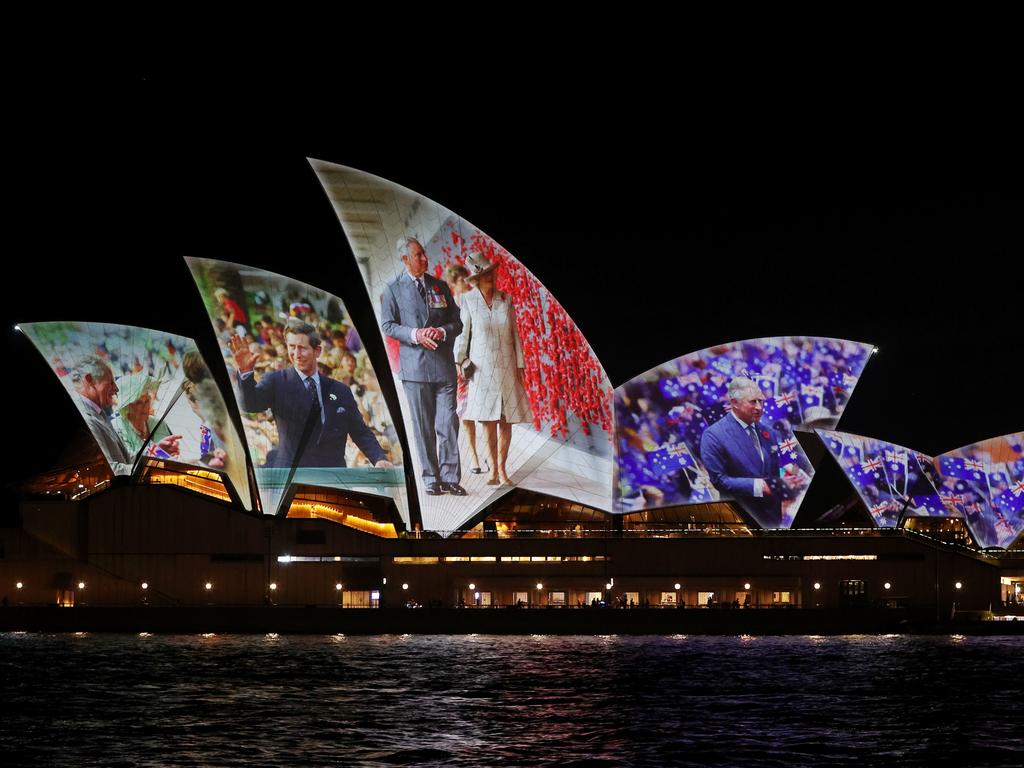 The Sydney Opera House sails are illuminated with images of the royals to officially welcome King Charles III and Queen Camilla. Picture: Getty Images