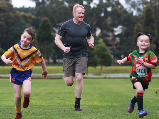 2/9/22: Former rugby league great James Graham, who is launching a new podcast called Head Noise for The Australian looking at the impact of concussion in sport, with kids from Paddington Colts. John Feder/The Australian.