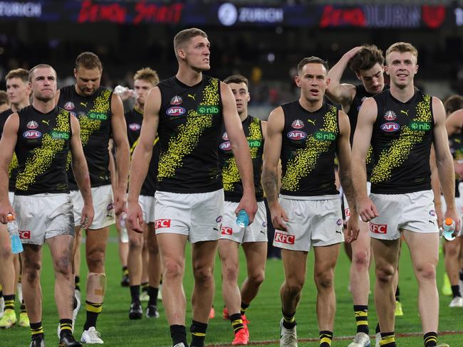 MELBOURNE, AUSTRALIA - APRIL 24: Richmond walk off during the 2025 AFL Round 07 match between the Melbourne Demons and the Richmond Tigers at the Melbourne Cricket Ground on April 24, 2025 in Melbourne, Australia. (Photo by James Wiltshire/AFL Photos via Getty Images)