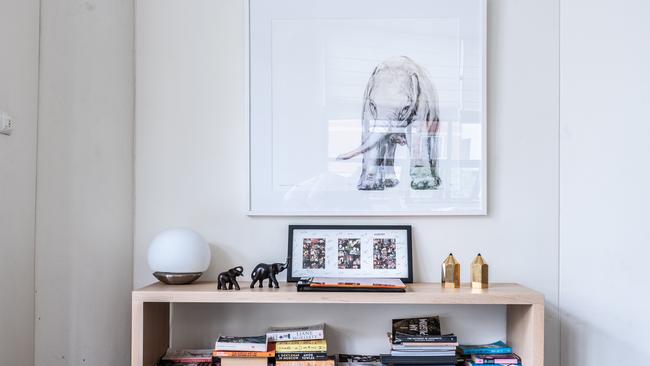 Annalise Brown’s elephant statue collection, overlooked by her beloved elephant painting. Picture: Flavio Brancaleone