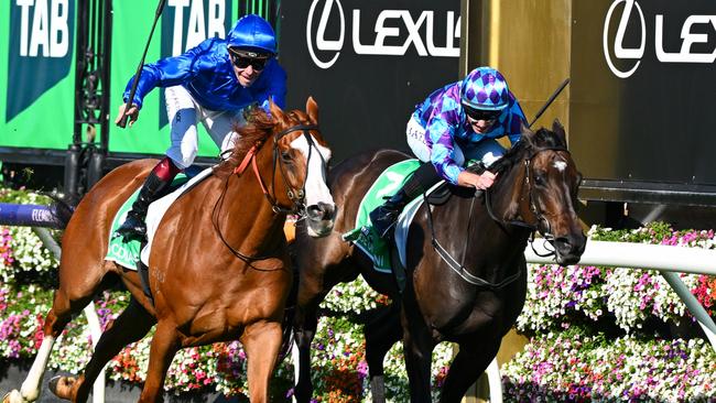 Cascadian (left) runs down Pride Of Jenni in the Australian Cup.