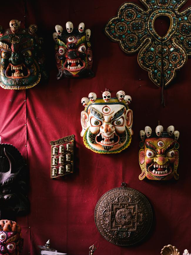 Wooden masks at a textile atelier in Bumthang. Picture: Chris Schalkx.