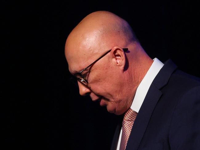 Australia's Opposition Leader Peter Dutton leaves the stage after conceding defeat in the general election at the Liberal Party election night event in Brisbane on May 3, 2025. Australia's right-leaning opposition leader Peter Dutton conceded defeat in a general election on May 3, saying he had spoken to Prime Minister Anthony Albanese. (Photo by Patrick Hamilton / AFP)