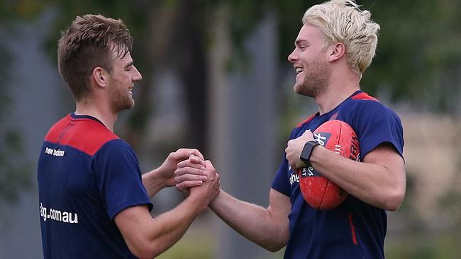 Dom Tyson greets Jack Watts this morning. Picture: Wayne Ludbey