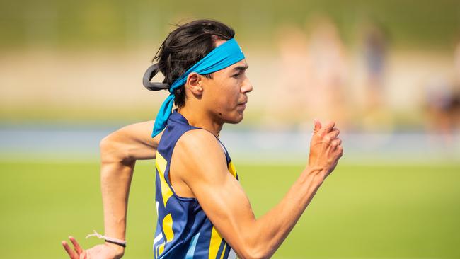 Xavier Perry from SACH on his way to the 200m victory.