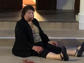 An elderly woman was left bloodied and bruised after a savage attack outside a church in South Yarra, Penelope Katsavos was left bloodied and bruised after the horrific attack.