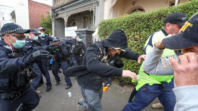 Protestors try to flee police. Picture: Alex Coppel