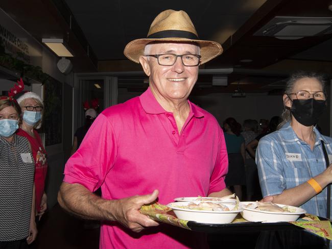 Turnbull serves food at the Wayside Chapel. Picture: Monique Harmer