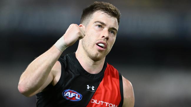 BRISBANE, AUSTRALIA – AUGUST 24: Zach Merrett of the Bombers celebrates kicking a goal during the round 24 AFL match between Brisbane Lions and Essendon Bombers at The Gabba, on August 24, 2024, in Brisbane, Australia. (Photo by Matt Roberts/AFL Photos/via Getty Images)