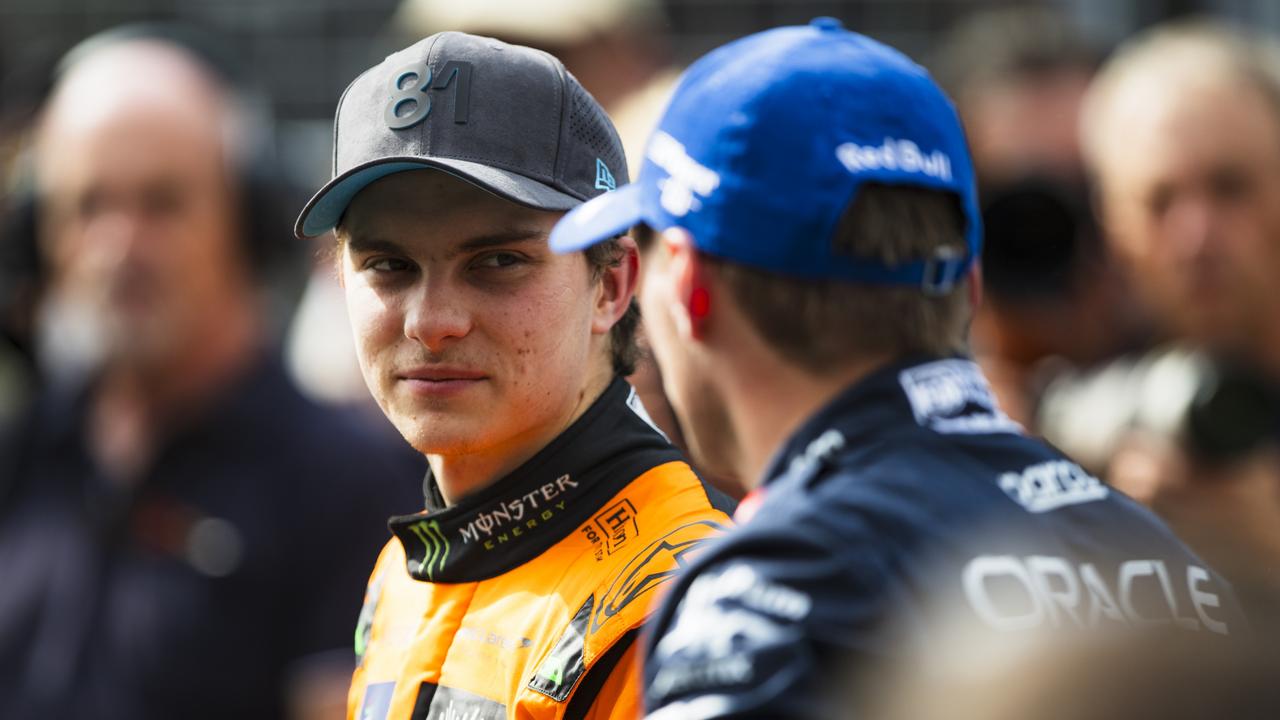 ZANDVOORT, NETHERLANDS - AUGUST 24: Third placed qualifier Oscar Piastri of Australia and McLaren interacts with Second placed qualifier Max Verstappen of the Netherlands and Oracle Red Bull Racing in parc ferme after qualifying ahead of the F1 Grand Prix of Netherlands at Circuit Zandvoort on August 24, 2024 in Zandvoort, Netherlands. (Photo by Rudy Carezzevoli/Getty Images)