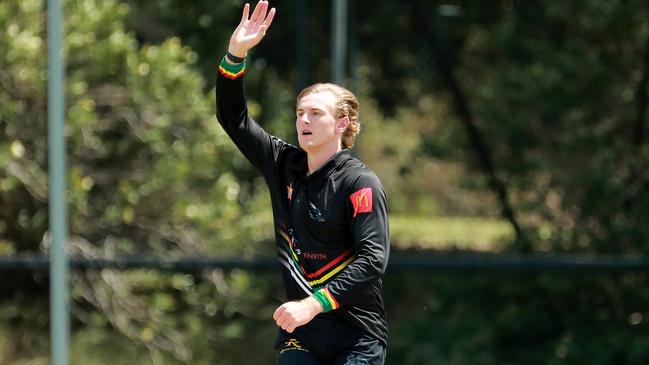 Henry Railz of Penrith bowling on a hot and steamy day.