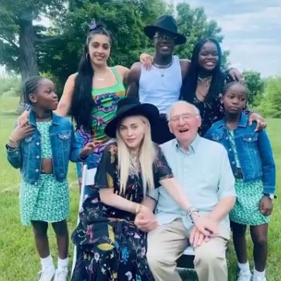 Madonna and her children pose with her father.