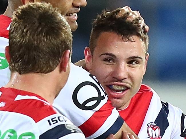 GOLD COAST, AUSTRALIA - JULY 15:  Sean O'Sullivan of the Roosters celebrates a try during the round 18 NRL match between the Gold Coast Titans and the Sydney Roosters at Cbus Super Stadium on July 15, 2018 in Gold Coast, Australia.  (Photo by Chris Hyde/Getty Images)