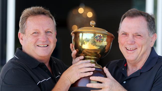 Gary Seaton and Rod Morris at Wynnum Manly, re-enact an old photo of the 1982 premiership. Picture: Annette Dew