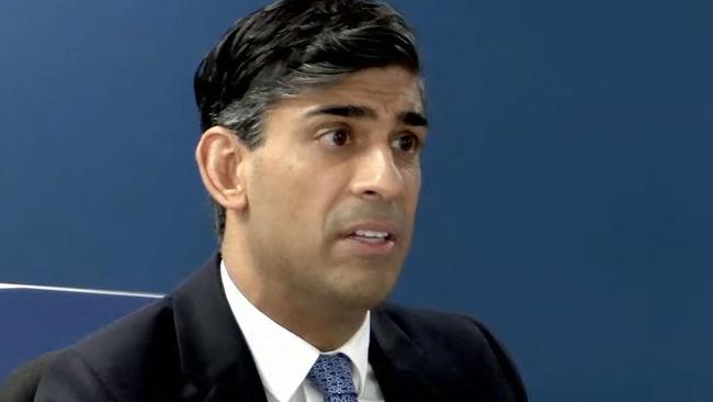 A video grab from footage broadcast by the UK Covid-19 Inquiry shows Britain's Prime Minister Rishi Sunak giving evidence at the UK Covid-19 Inquiry, in west London, on December 11, 2023. Sunak faced questions Monday over whether his "Eat Out to Help Out" scheme to help the struggling hospitality sector during the pandemic spurred the spread of Covid-19. Sunak, who was finance minister at the time, gave evidence to the public inquiry into the UK government's handling of the crisis. (Photo by UK Covid-19 Inquiry / AFP) / XGTY / RESTRICTED TO EDITORIAL USE - MANDATORY CREDIT "AFP PHOTO / UK Covid-19 Inquiry " - NO MARKETING - NO ADVERTISING CAMPAIGNS - DISTRIBUTED AS A SERVICE TO CLIENTS