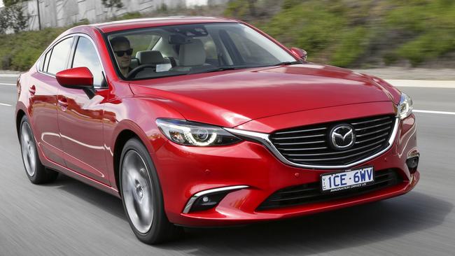 Daily driver: Rollins went into a humble Mazda6 sedan after five years of Infiniti cars. Picture: Supplied.