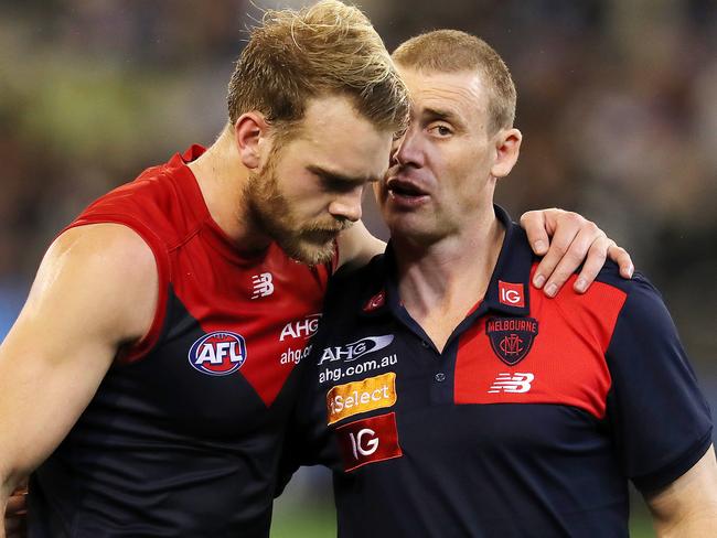AFL Round 12. Melbourne vs. Collingwood at the MCG. Melbourne coach Simon Goodwin talks with Jack Watts at 3 qtr time  . Pic: Michael Klein