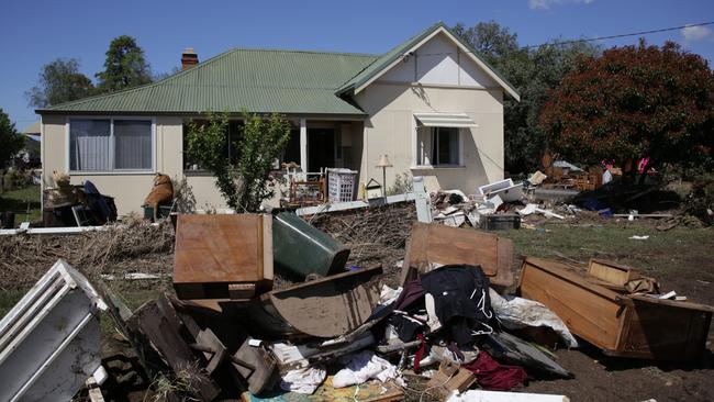 One of the many flood-damaged homes in the town. Picture: Dean Marzolla