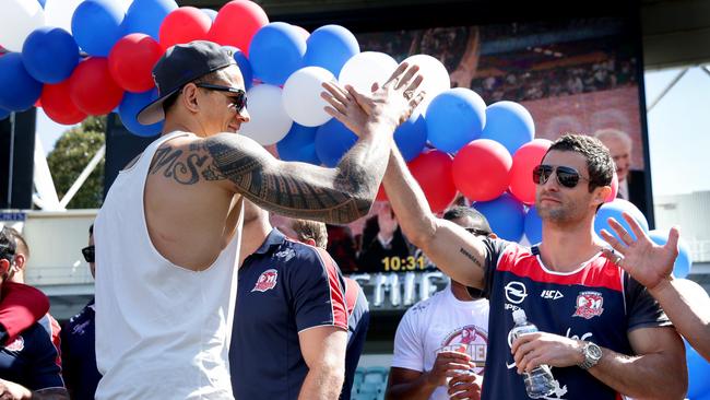 Sonny Bill Williams and Anthony Minichiello celebrate their 2013 victory.