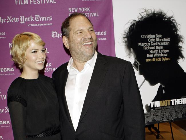 Actor Michelle Williams and Harvey Weinstein arrive at the New York Film Festival screening of the film, 'I'm Not There' in 2007.