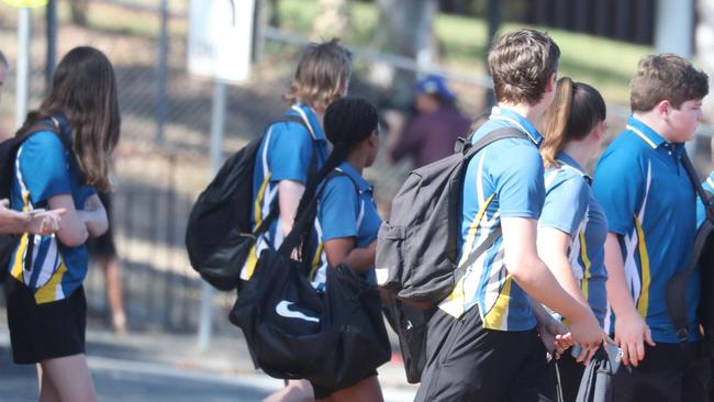 Children are evacuated from Albany Creek State High School on Thursday. Picture: Annette Dew