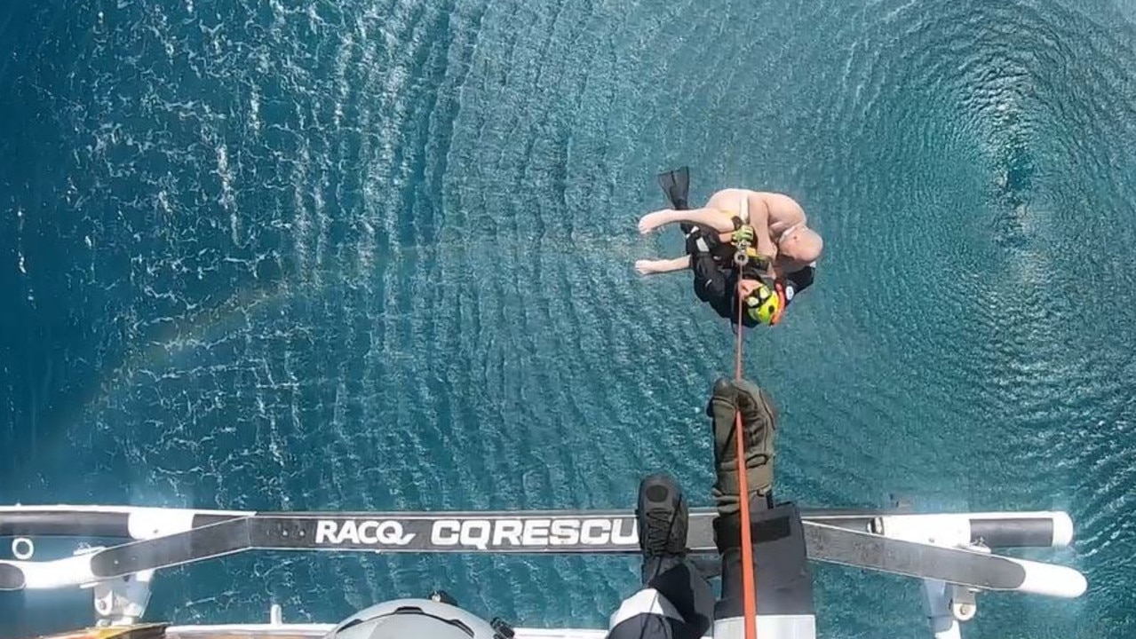 A man was winched to safety from waters in the Coral Sea – 170km offshore from Mackay – after a 7m boat overturned on Thursday. Picture: Supplied / RACQ CQ Rescue