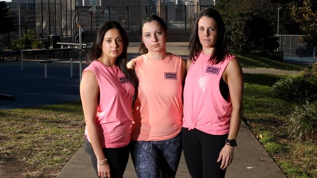 Anubha Rawat, Ariane Psomotragos and Allison Kearns from PARKSWEAT exercise group said they felt unsafe after they finished their work outs. Picture: Damian Shaw