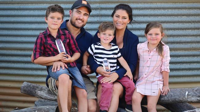 Happy family: The Weekly Times Coles 2015 Farmer of the Year Grant and Naomi Sims celebrate their win with their children River, Shiloh and Hunter.