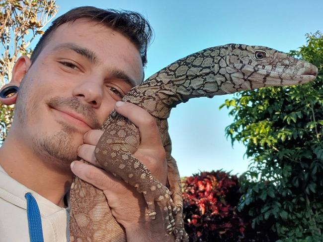 Nathan Chetcuti with one of his beloved reptiles.