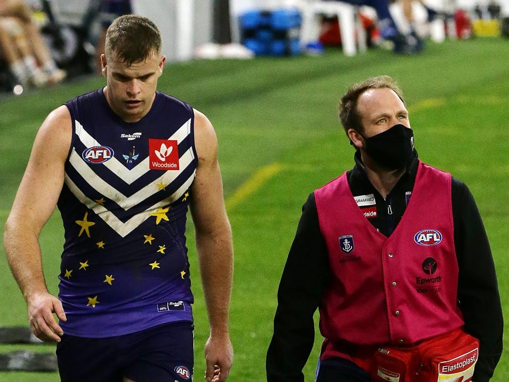 Darcy (L) was the Dockers’ brightest spark on a dark night but a knee injury cut his game short. (Photo by Will Russell/AFL Photos via Getty Images)