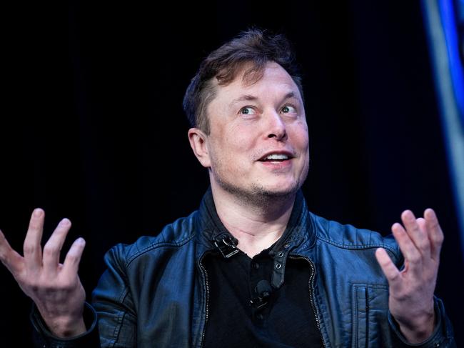 (FILES) In this file photo Elon Musk, founder of SpaceX, speaks during the Satellite 2020 at the Washington Convention Center on March 9, 2020, in Washington, DC. - Tesla began officially accepting bitcoin as currency to purchase electric autos, Chief Executive Elon Musk said on March 24, 2021 a with bitcoin," Musk said on Twitter, implementing a plan announced in February to accept the cryptocurrency as a form of payment. (Photo by Brendan Smialowski / AFP)