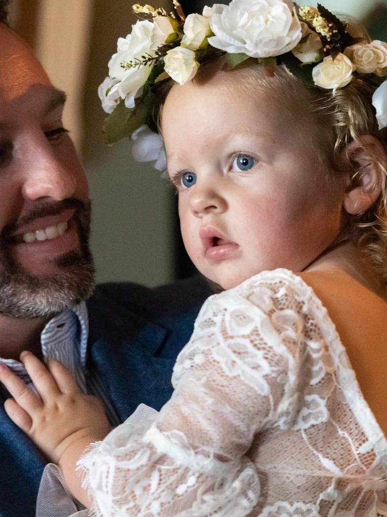 Ben Wright with his daughter, Evie, on Troy and Danni Andrews' wedding day Picture: Supplied