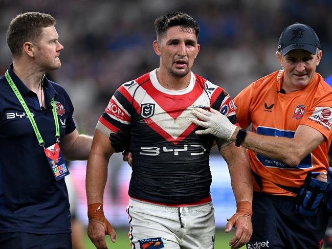 Victor Radley is helped from the field following a head knock. Picture: NRL Photos