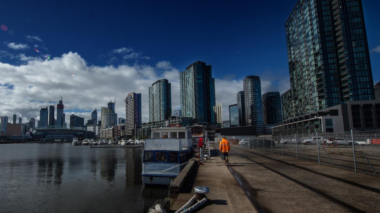 Or walk along the water at Docklands. Picture: Tony Gough