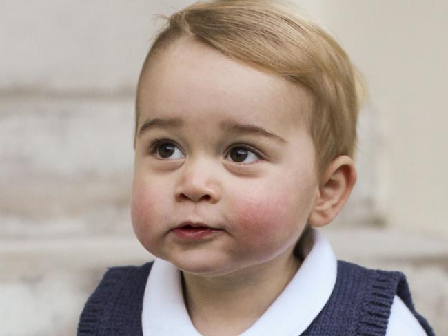 (FILES) An undated handout picture issued by the Duke and Duchess of Cambridge on December 13, 2014 and taken in late November, one of three official Christmas images, shows Britain's Prince George of Cambridge sitting in a courtyard at Kensington Palace in London. Whether wrapped in pink or blue, the new baby of Kate, Duchess of Cambridge, will have the power to influence trends across the globe as the latest addition to a powerful fashion dynasty. Though Prince George has yet to reach his second birthday, he can claim influence. British brand Cath Kidston is considering re-issuing a soldier-print jumper he was pictured wearing "due to popular demand", a spokesperson said. RESTRICTED TO EDITORIAL USE - MANDATORY CREDIT " AFP PHOTO / DUKE AND DUCHESS OF CAMBRIDGE " - NO MARKETING NO ADVERTISING CAMPAIGNS - NO SALES - RESTRICTED TO SUBSCRIPTION USE - NO COMMERCIAL USE - DISTRIBUTED AS A SERVICE TO CLIENTS