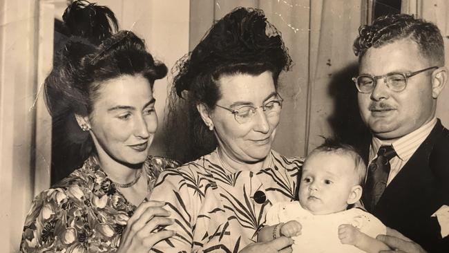 Lady Cilento, second from left, and her son, Raff Cilento, right, who would father Kath Walker's child, during her time as a domestic in Cilento mansion.