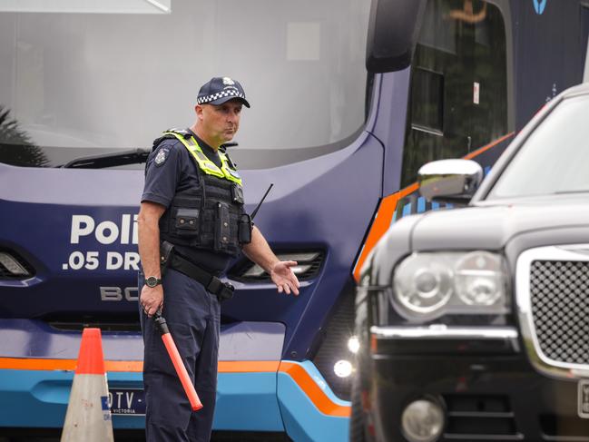 MELBOURNE, AUSTRALIA - NewsWire Photos DECEMBER 23, 2022 : Victoria Police pull over drivers at a roadside drug and alcohol testing site in Southbank, as part of Operation Roadwise in the lead up to Christmas. Picture NCA NewsWire / Ian Currie