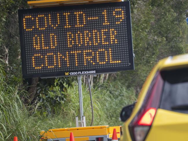 26th March 2020Traffic is seen backed up from New South Wales entering Queensland on the Gold Coast Hwy at Coolangatta. Police roadblocks have been set up designed to stop the spread of Covid-19.Photo: Glenn Hunt / The Australian